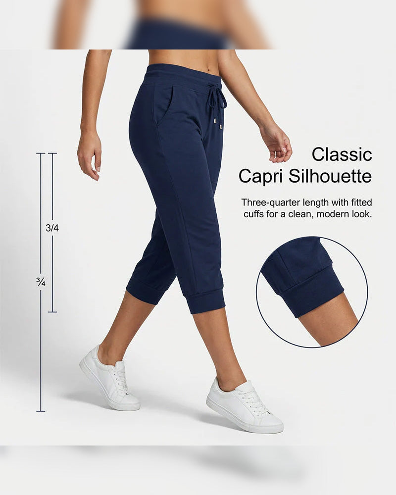 Pantalon à 3/4 longue avec poche de couleur unie