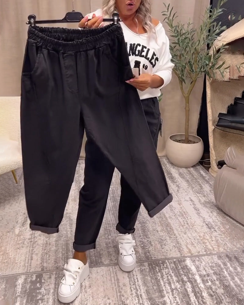 Pantalon décontracté de couleur unie avec poche