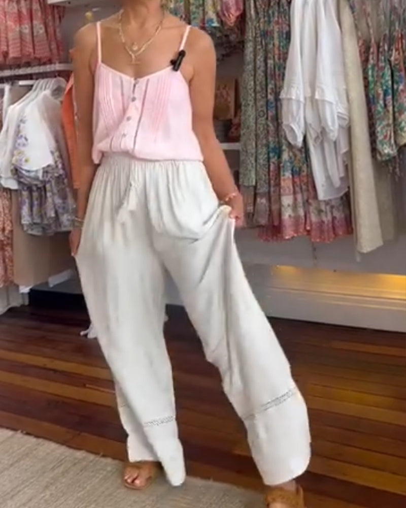 Pantalon large confortable de couleur unie avec poches