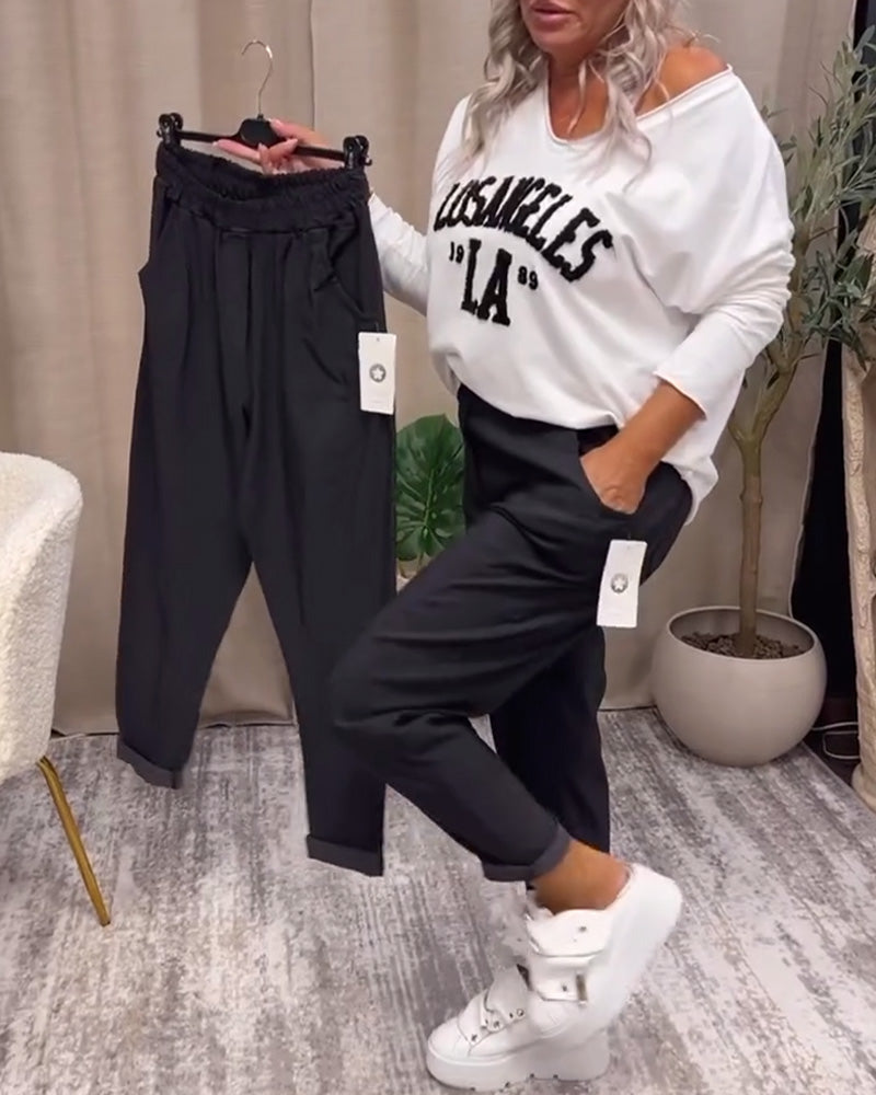 Pantalon décontracté de couleur unie avec poche